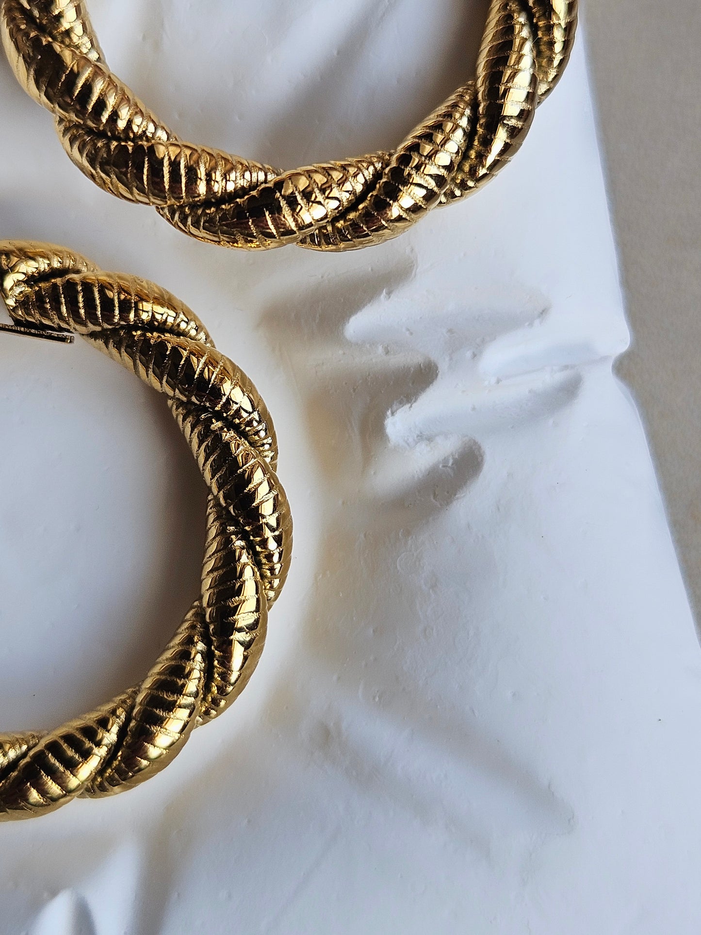 Orecchini Hoop Intrecciati