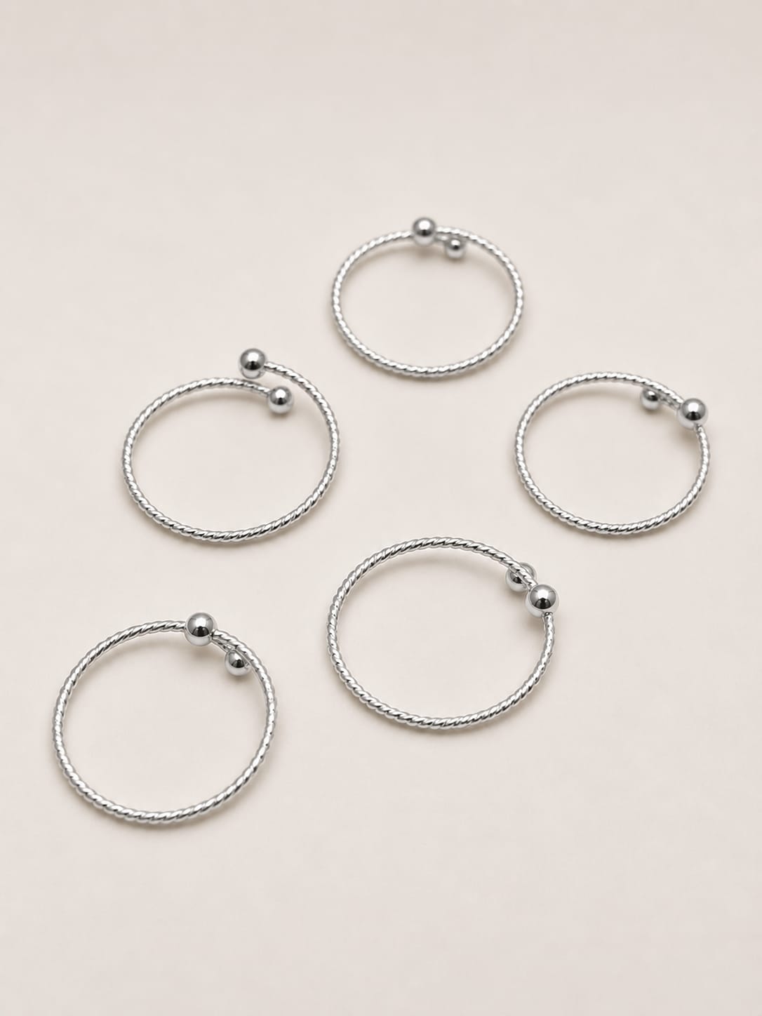 Set 5 fedine regolabili zigrinate